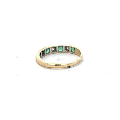 9ct yellow gold ring with diamond and emerald accents, size K, featuring a detailed gemstone design.