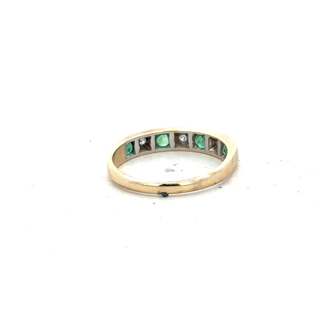 9ct yellow gold ring with diamond and emerald accents, size K, featuring intricate design and sparkling gemstone details.