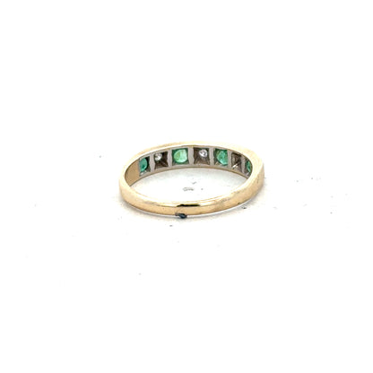9ct yellow gold ring with diamond and emerald accents, size K, featuring intricate design and sparkling gemstone details.