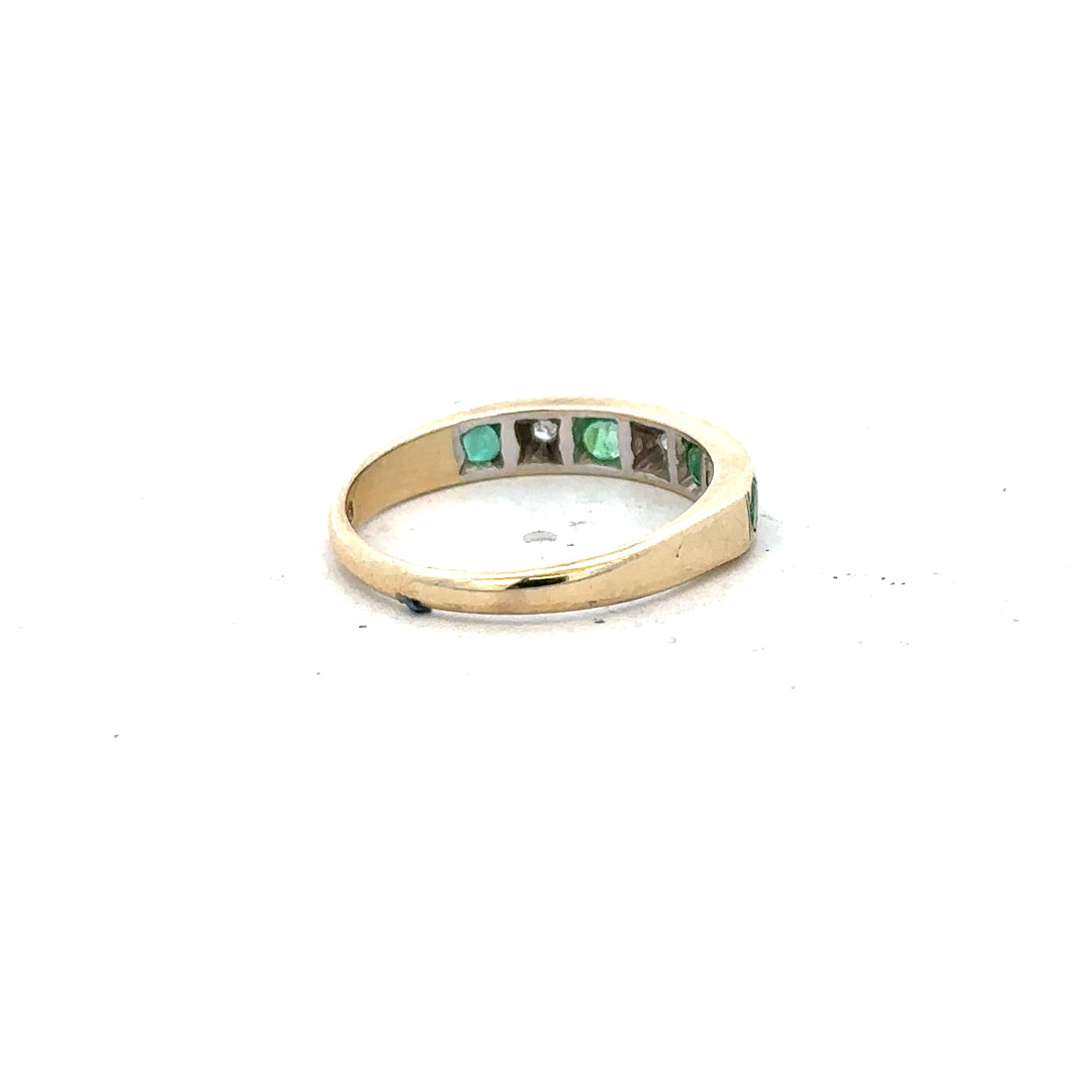 9ct yellow gold ring with diamond and emerald accents, size K, featuring intricate design and sparkling gemstones.
