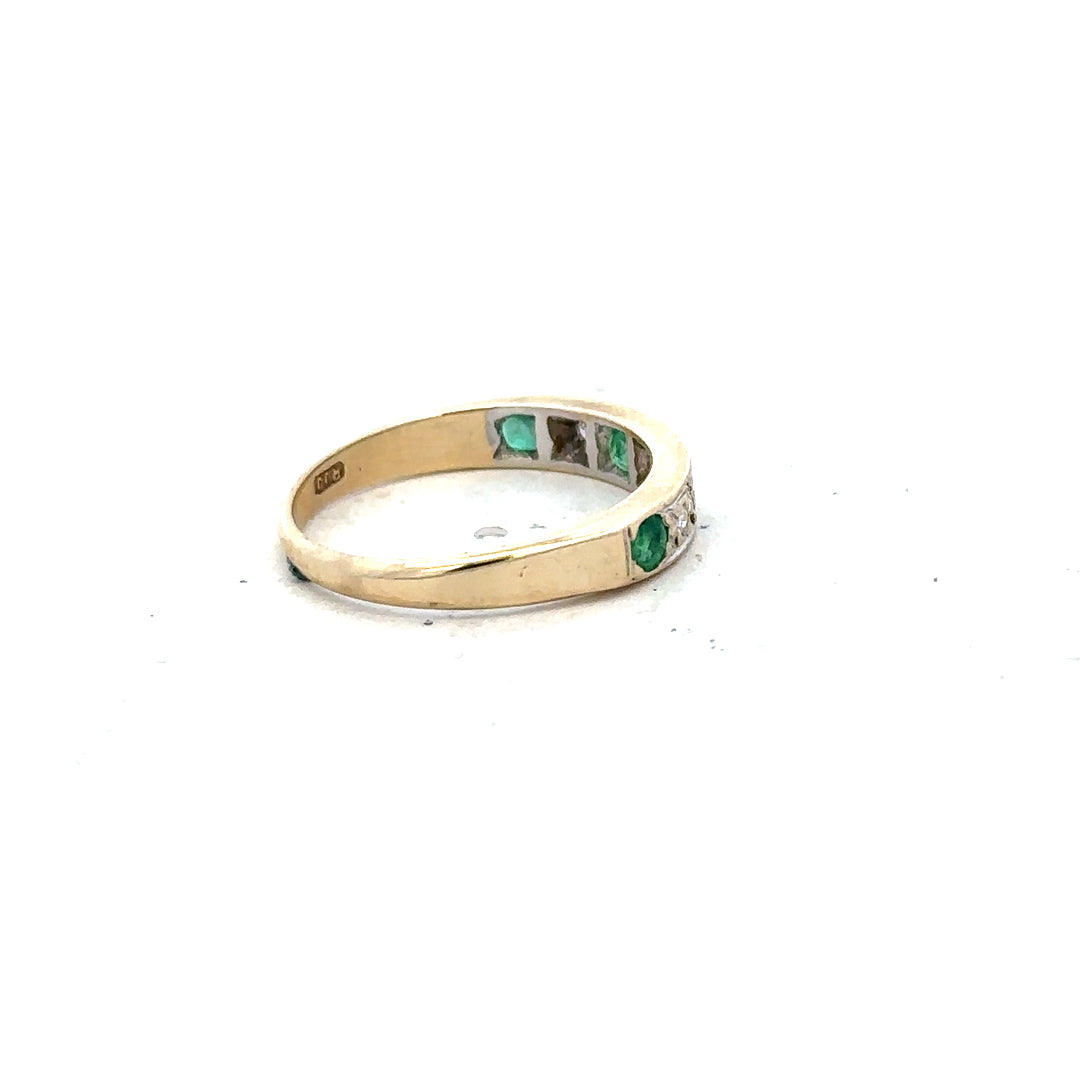 9ct yellow gold diamond and emerald ring in size K, featuring a central emerald and diamond accents, unbranded jewelry.