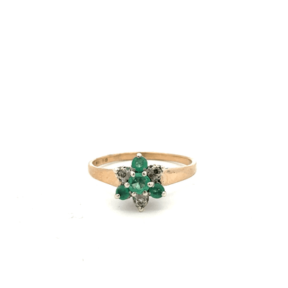 9ct yellow gold ring with diamond and emerald accents, size O, featuring a detailed gemstone design.