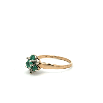 9ct yellow gold ring with diamond and emerald accents, size O, featuring a detailed design and unbranded craftsmanship.