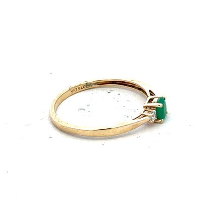 9ct yellow gold ring with diamonds and emeralds, size S, showcasing intricate gemstone and gold band design.