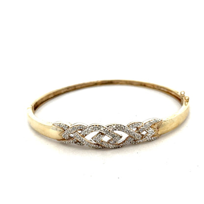 9ct yellow gold diamond bangle bracelet with sparkling diamonds and a sleek design, unbranded, weight 10g.