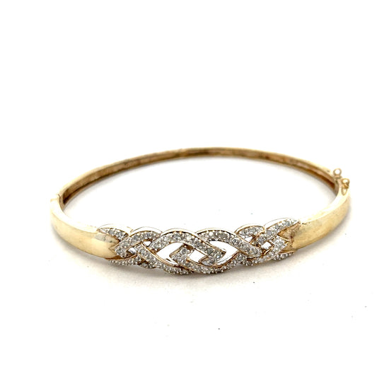 9ct yellow gold diamond bangle bracelet with sparkling diamonds and a sleek design, unbranded, weight 10g.