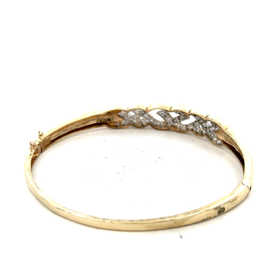 9ct yellow gold diamond bangle bracelet with sparkling diamonds and elegant design, weighs 10g.