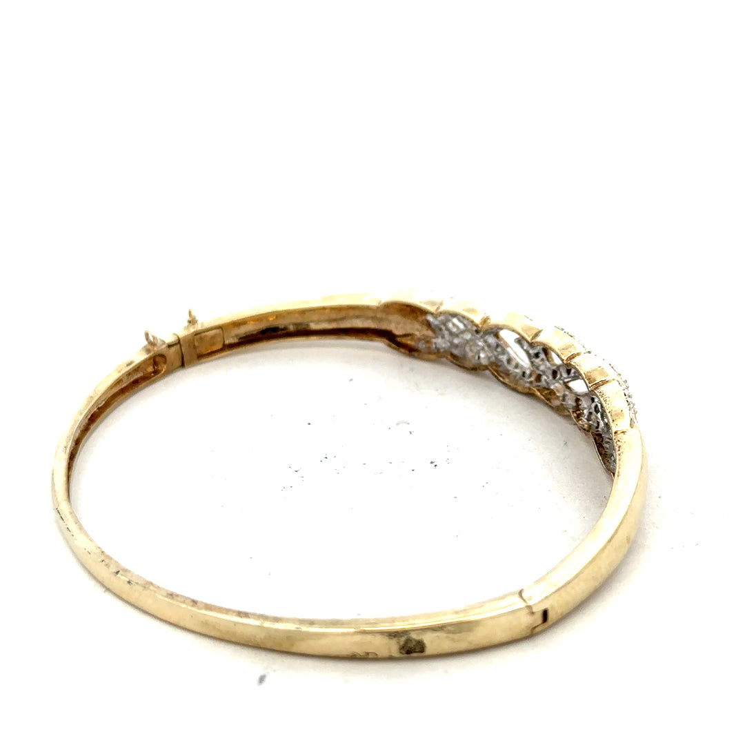 9ct yellow gold diamond bangle bracelet with a polished finish, featuring small sparkling diamonds, unbranded and 10g weight.