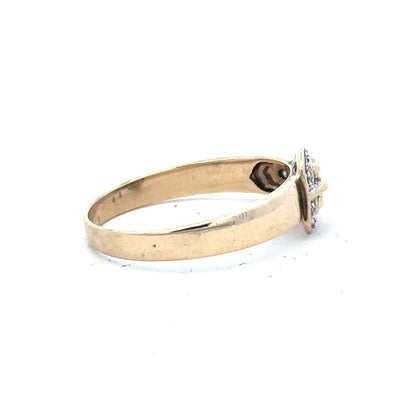 9ct yellow gold diamond buckle ring in size R, featuring a polished gold band with a decorative diamond-encrusted buckle detail.