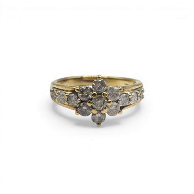 9ct yellow gold diamond cluster ring with sparkling diamonds, showcasing a classic design and elegant craftsmanship.