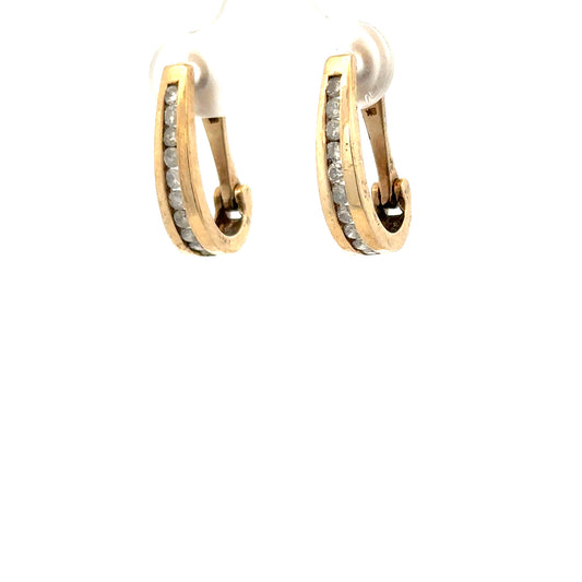 9ct yellow gold diamond earrings featuring sparkling diamonds and a classic design, weighing 3.1 grams.