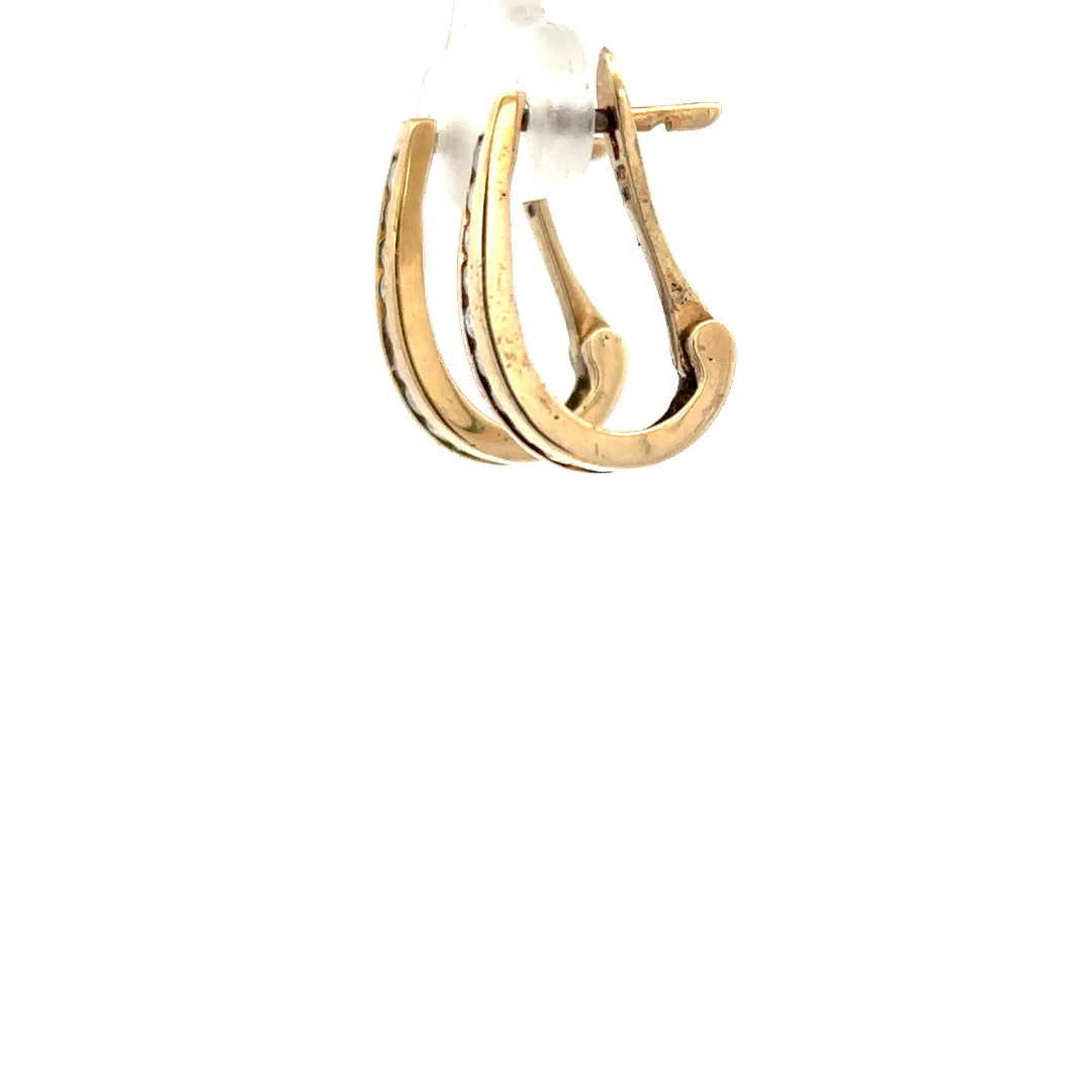 9ct yellow gold diamond earrings with a classic stud design, featuring sparkling diamonds and a polished finish.