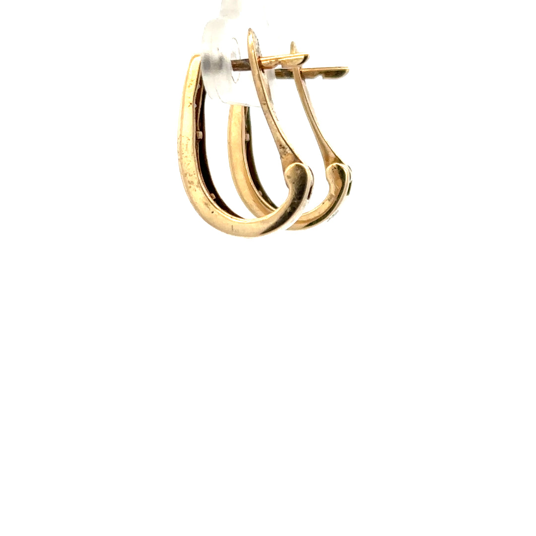 9ct yellow gold diamond earrings with sparkling stones, weighing 3.1g, showcasing elegant and timeless jewelry design.