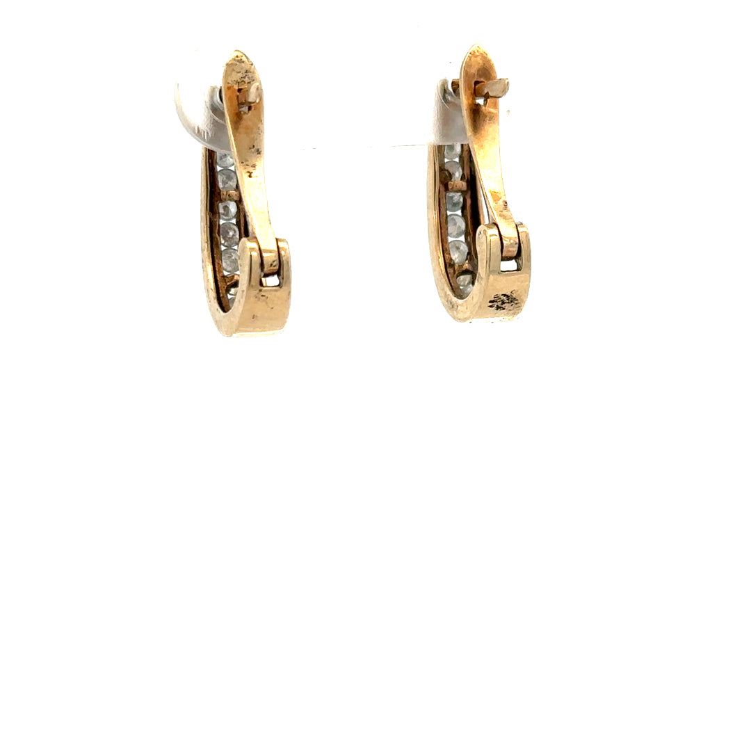 9ct yellow gold diamond earrings featuring sparkling diamonds, weight 3.1g, with classic and elegant design.