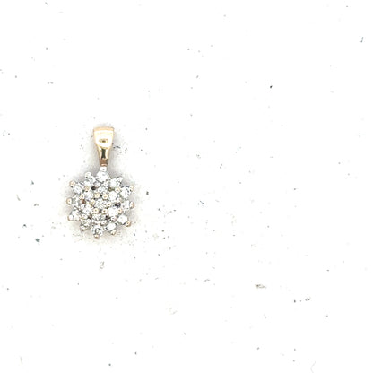 9ct yellow gold diamond pendant with delicate design, weighing 0.6g, showcasing sparkling diamonds on a fine chain.