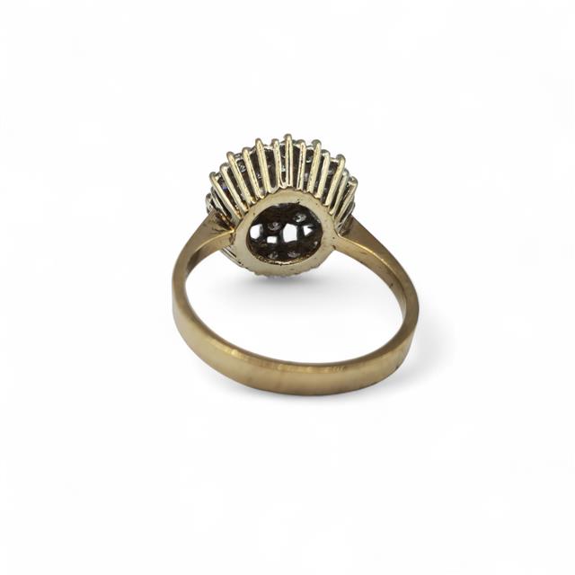 9ct yellow gold diamond ring with a sleek band and sparkling diamonds, showcasing elegant jewelry craftsmanship.