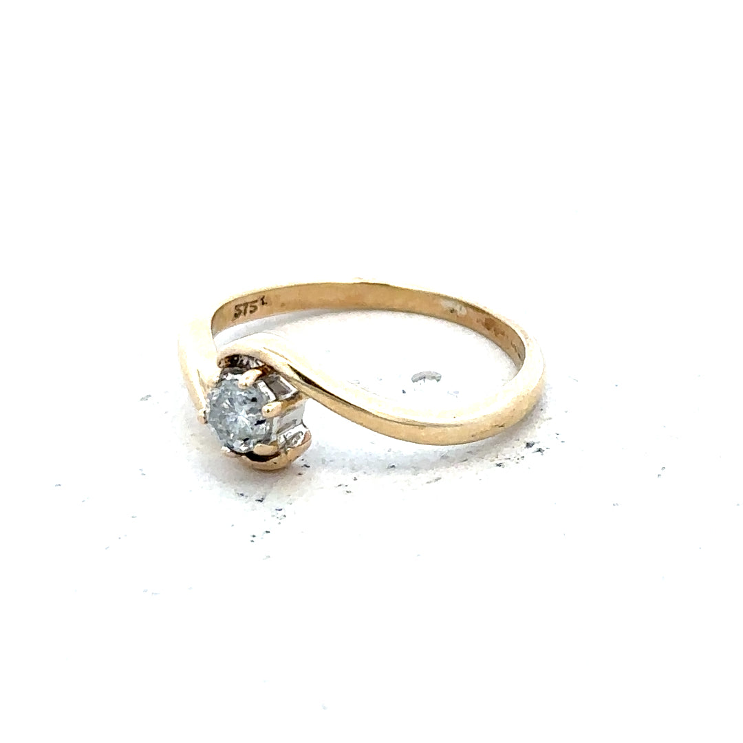 9ct yellow gold diamond ring in size I 1/2 with 1.6g weight, featuring a sparkling diamond setting.