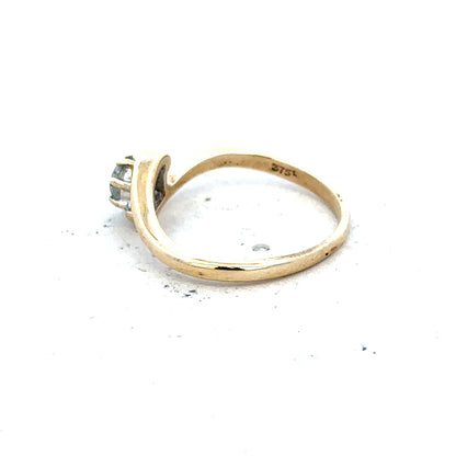 9ct yellow gold diamond ring in size I 1/2, unbranded, featuring a sparkling diamond setting and a lightweight 1.6g design.