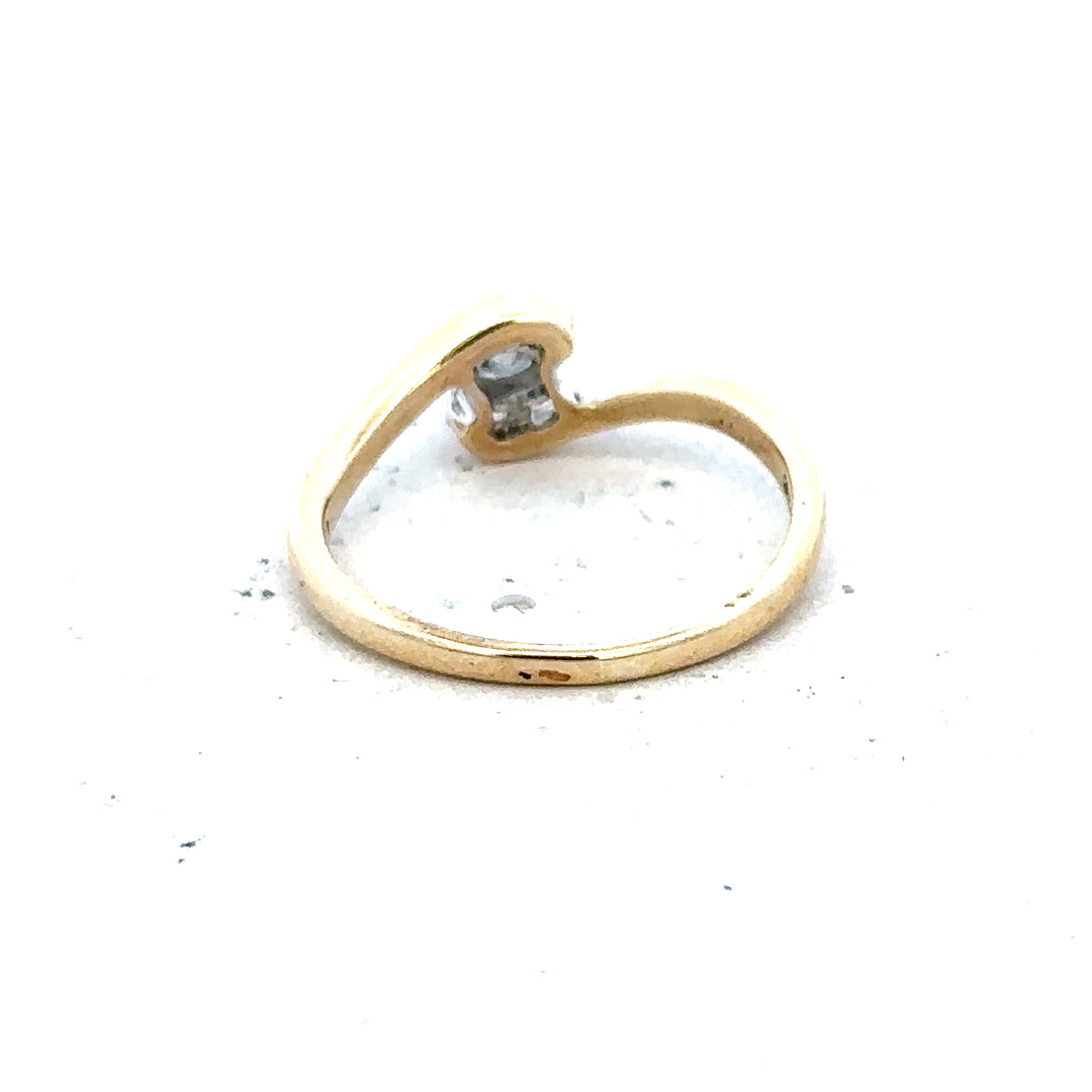 9ct yellow gold diamond ring, size I 1/2, unbranded, with a sleek design and sparkling diamonds, weighing 1.6 grams.