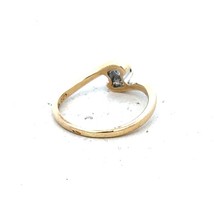 9ct yellow gold diamond ring in size I 1/2, unbranded, featuring a sparkling diamond and a sleek, polished band.