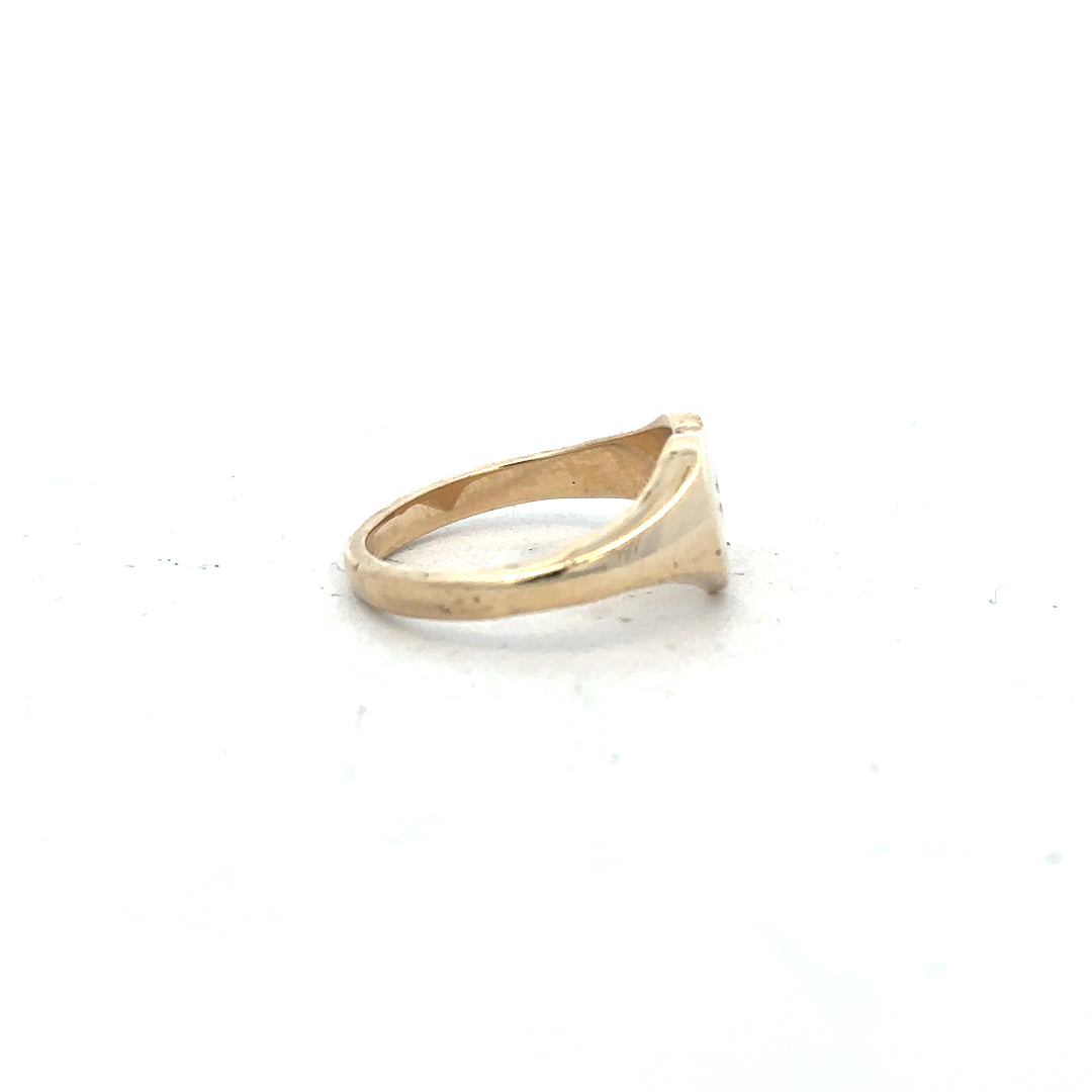 9ct yellow gold diamond ring in size J with a sparkling diamond, unbranded jewelry piece with elegant design.