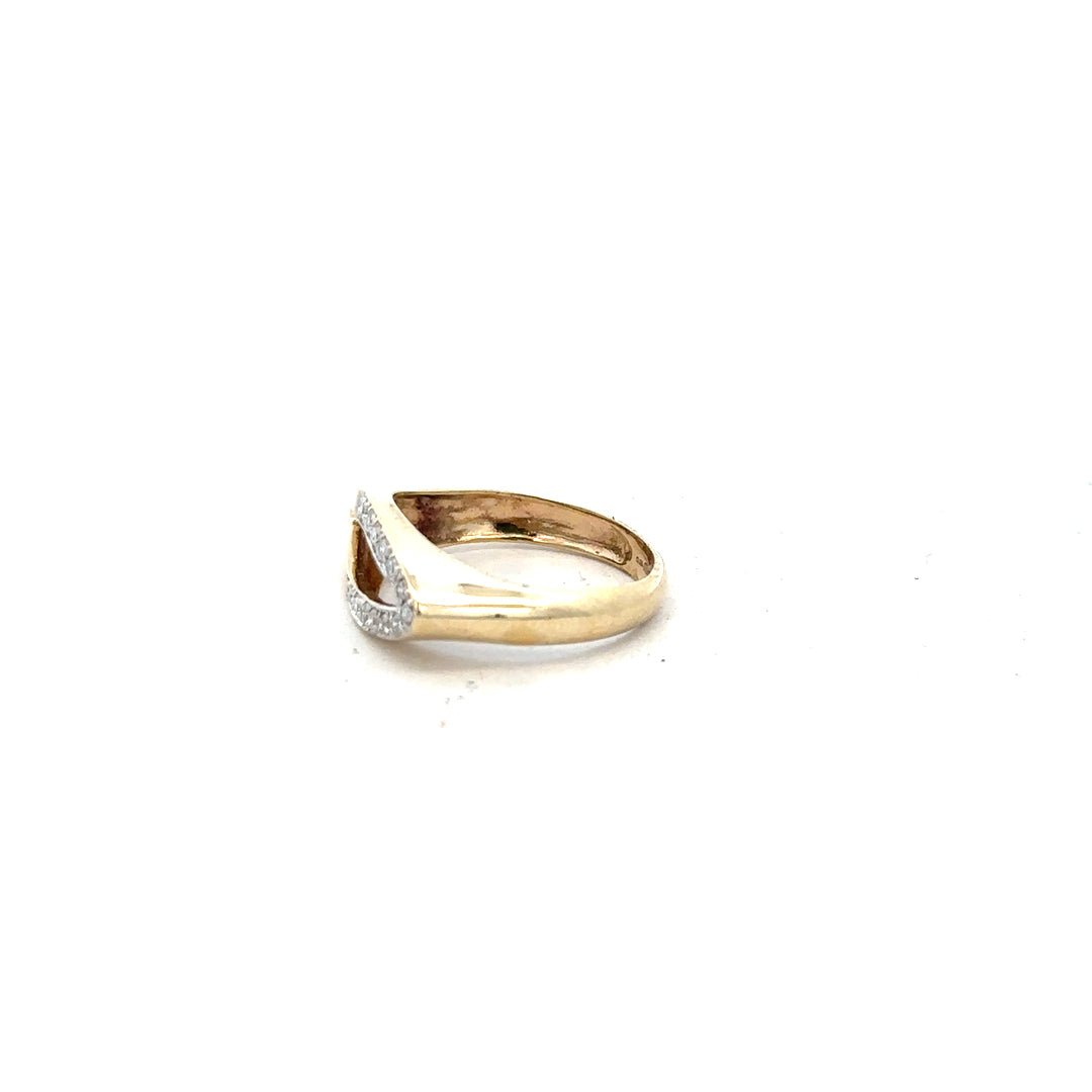 9ct yellow gold diamond ring in size J, featuring a sparkling central diamond and elegant design.