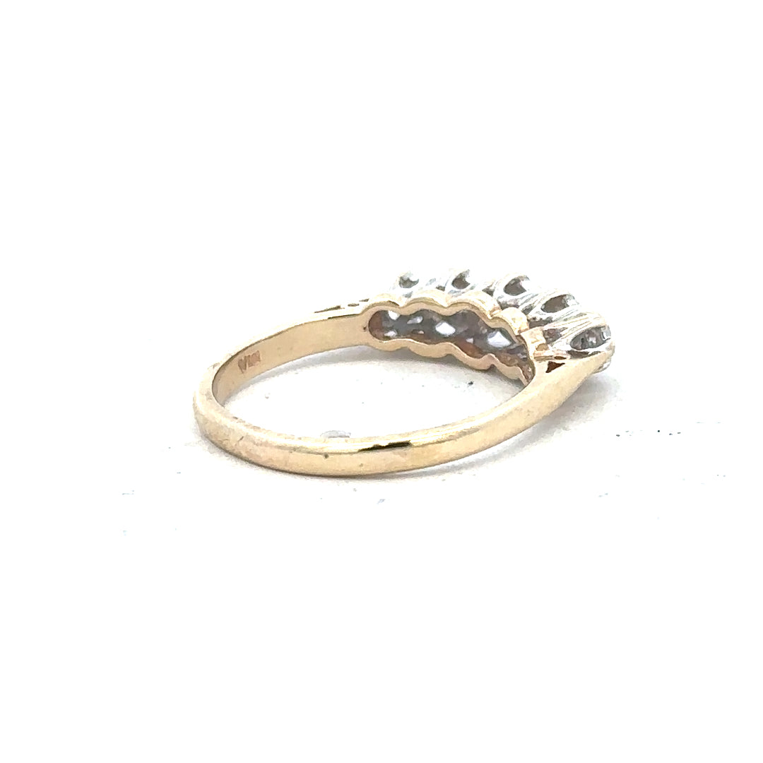 9ct yellow gold diamond ring in size J with sparkling diamonds, unbranded, showcasing elegant jewelry craftsmanship.