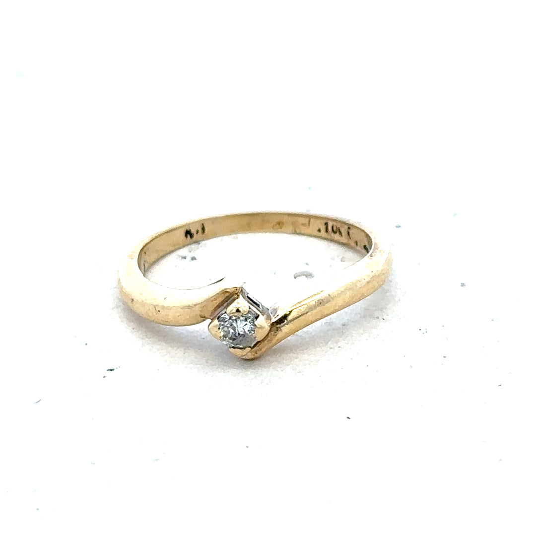 9ct yellow gold diamond ring in size K 1/2, unbranded, featuring a sparkling diamond setting and a total weight of 2.3 grams.