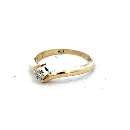9ct yellow gold diamond ring in size K 1/2 with 2.3g, featuring sparkling diamonds on a classic unbranded jewelry piece.