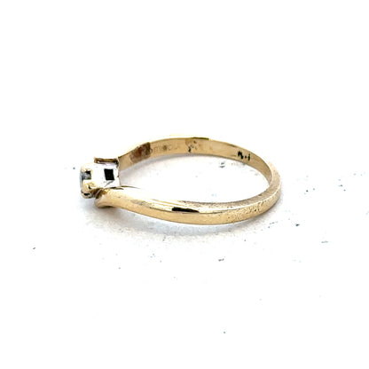 9ct yellow gold diamond ring in size K 1/2 with 2.3g, featuring a classic design and sparkling diamonds.