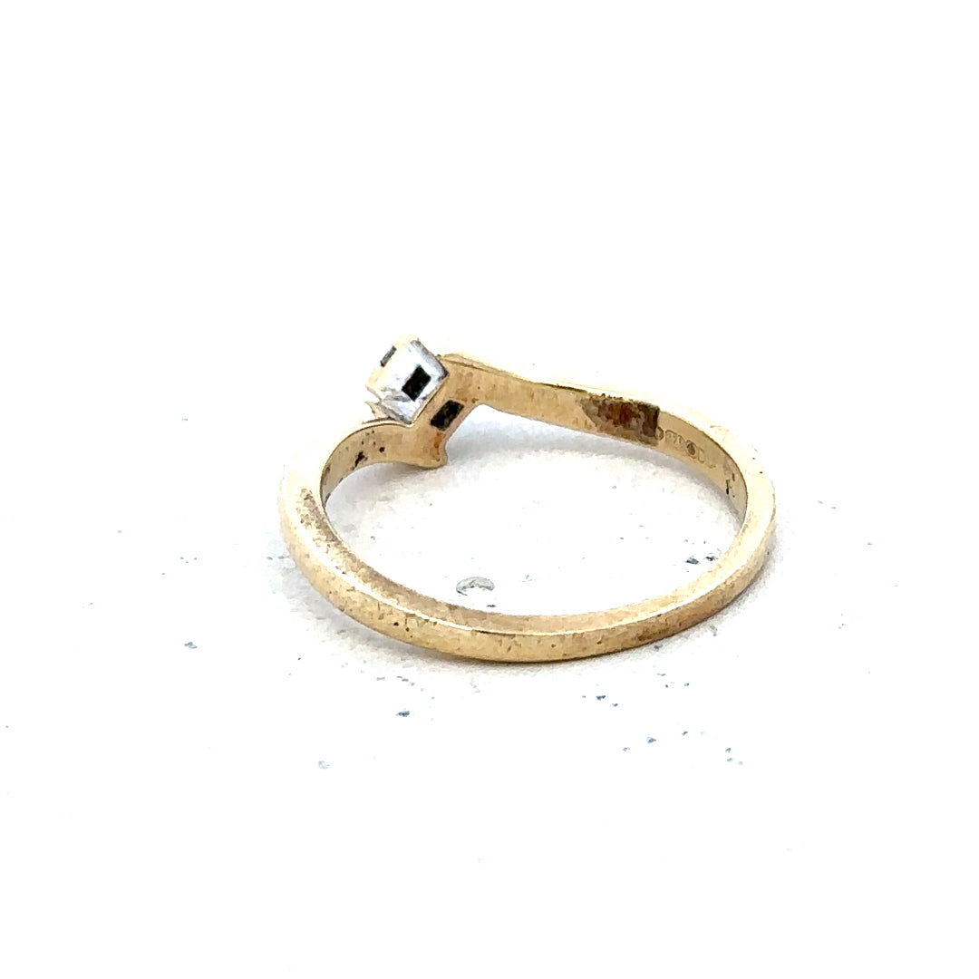 9ct yellow gold diamond ring, size K 1/2, unbranded, featuring a sparkling diamond setting and a total weight of 2.3 grams.