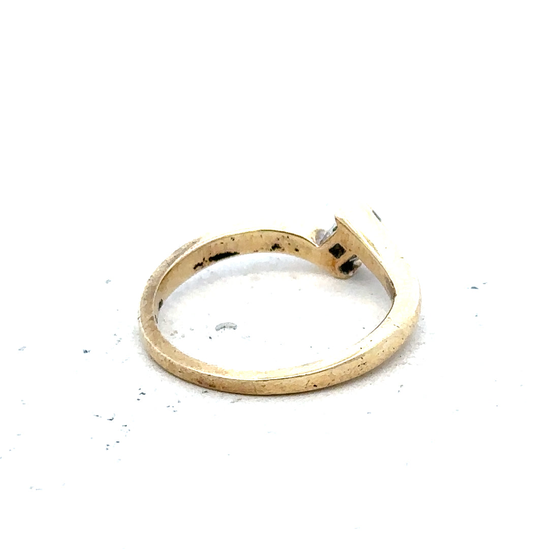 9ct yellow gold diamond ring in size K 1/2, unbranded, showcasing a sparkling diamond setting and elegant design.