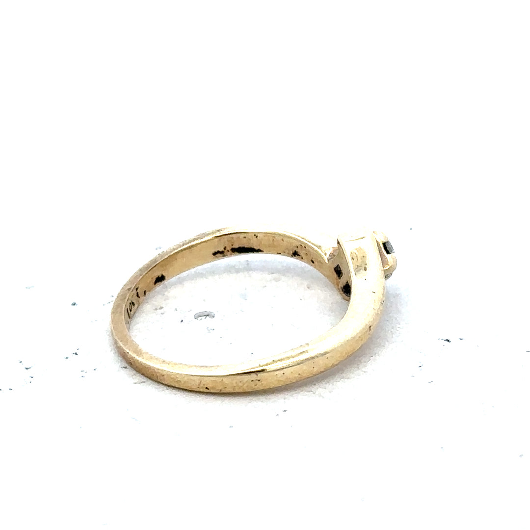 Unbranded 9ct yellow gold diamond ring in size K 1/2, showcasing a sparkling diamond set in a classic band.