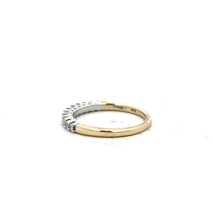 9ct yellow gold diamond ring in size K, featuring a sparkling diamond set in an elegant unbranded jewelry design.