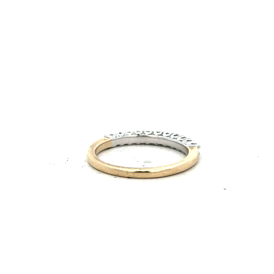 9ct yellow gold diamond ring in size K with sparkling diamonds, unbranded jewelry accessory, close-up view of the ring.