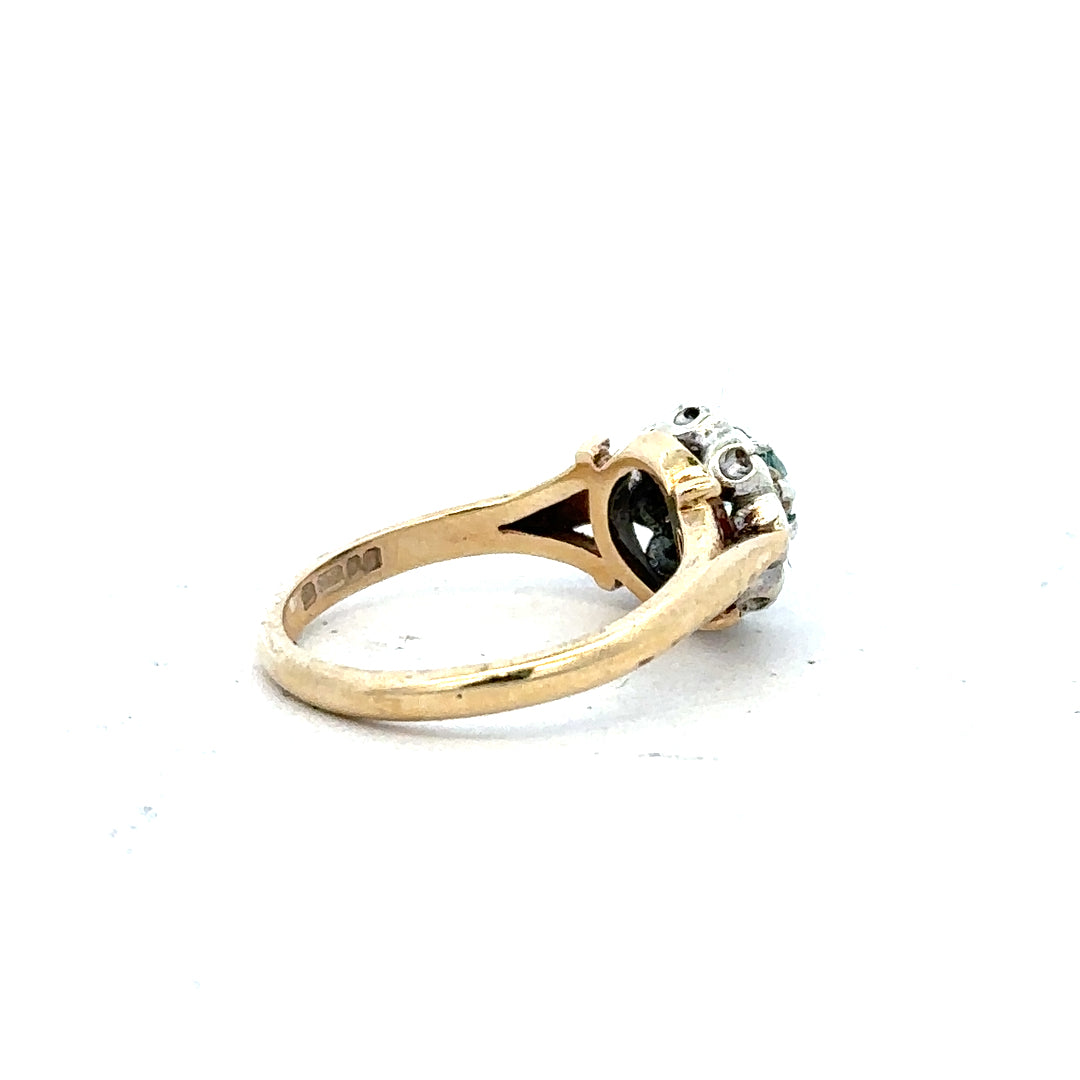 9ct yellow gold diamond ring in size K, featuring a sparkling diamond centerpiece and a polished gold band.