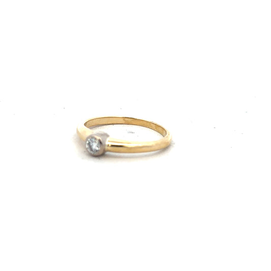 9ct yellow gold diamond ring size K with sparkling diamonds, unbranded jewelry showcased in a close-up image.