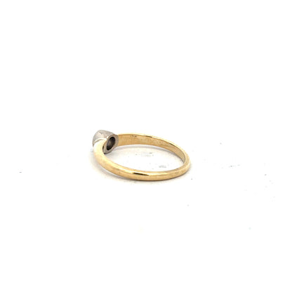 9ct yellow gold diamond ring in size K, featuring a sparkling diamond setting on a classic unbranded jewelry design.