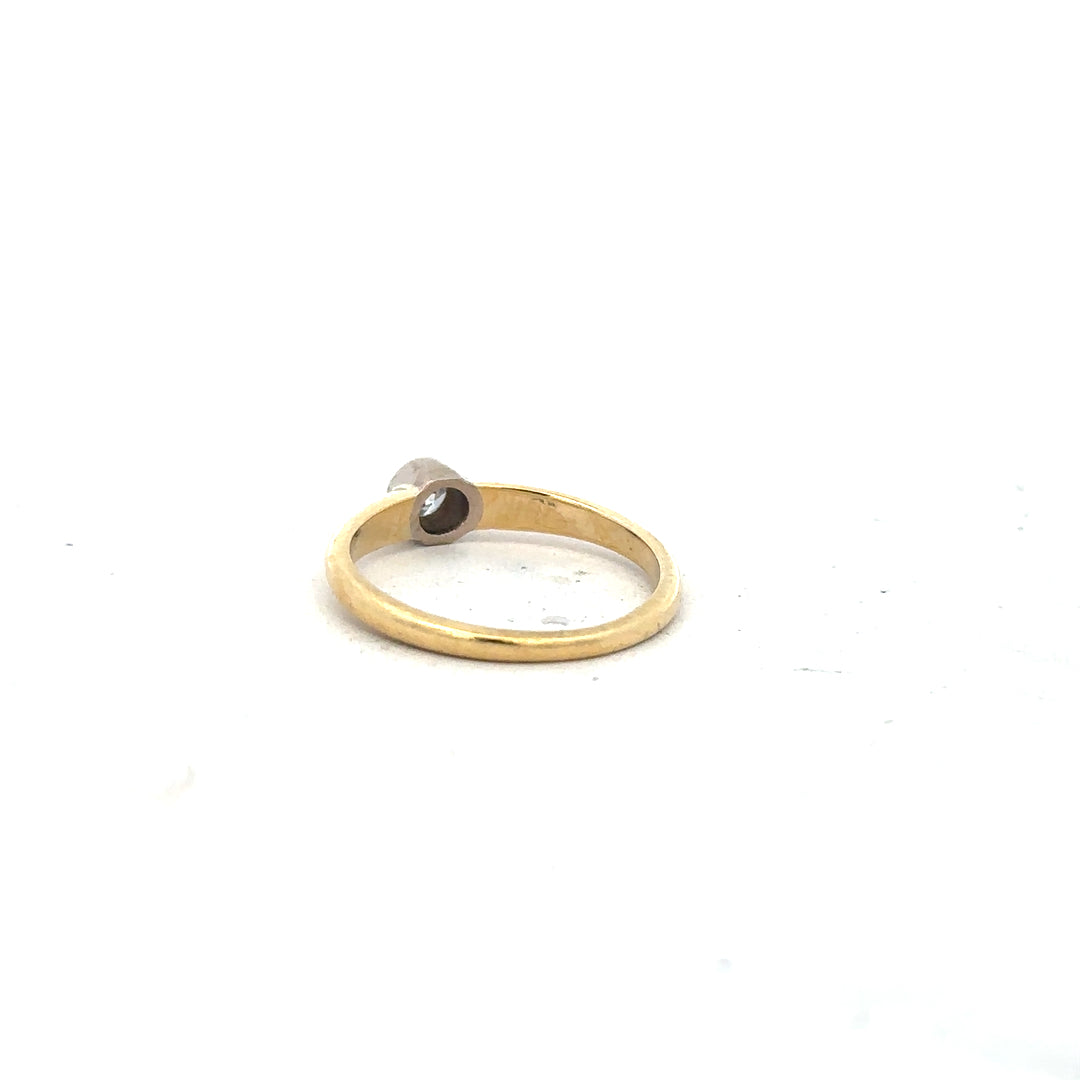 9ct yellow gold diamond ring, size K, featuring a sparkling diamond, unbranded jewelry with elegant design.