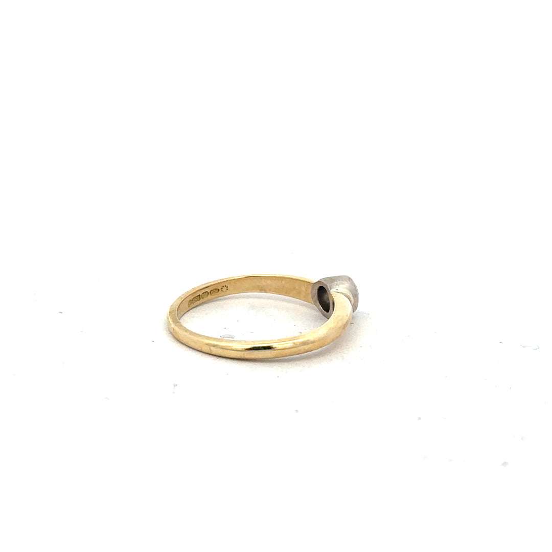 9ct yellow gold diamond ring in size K, featuring a sparkling diamond set in a sleek gold band.