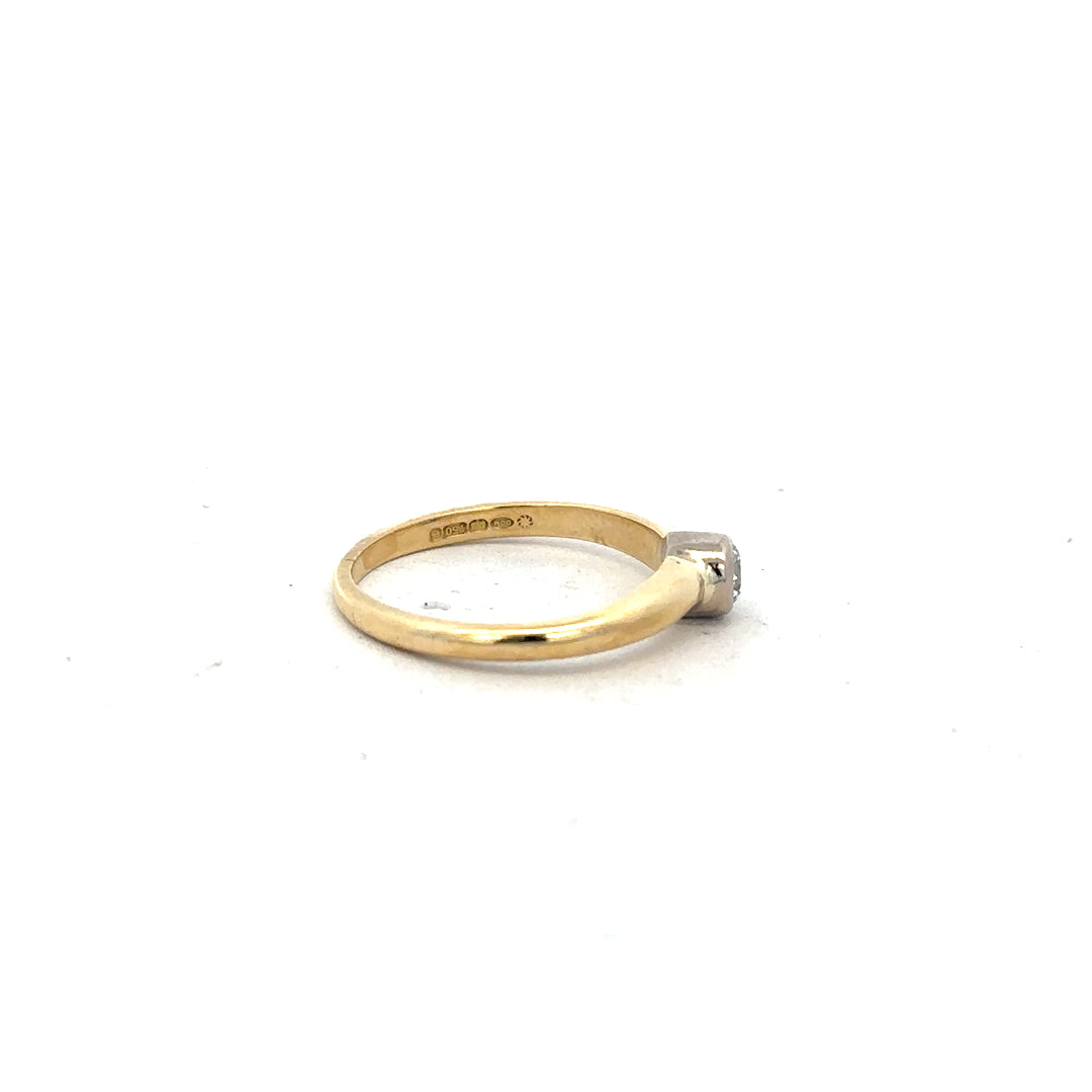 9ct yellow gold diamond ring in size K, featuring a sparkling diamond setting and a classic design.