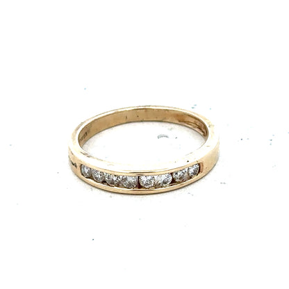 9ct yellow gold diamond ring in size K1/2, featuring a sparkling diamond setting on a classic band.