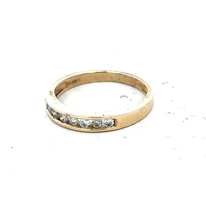 9ct yellow gold diamond ring in size K1/2, featuring a sparkling diamond setting and a sleek, elegant band.