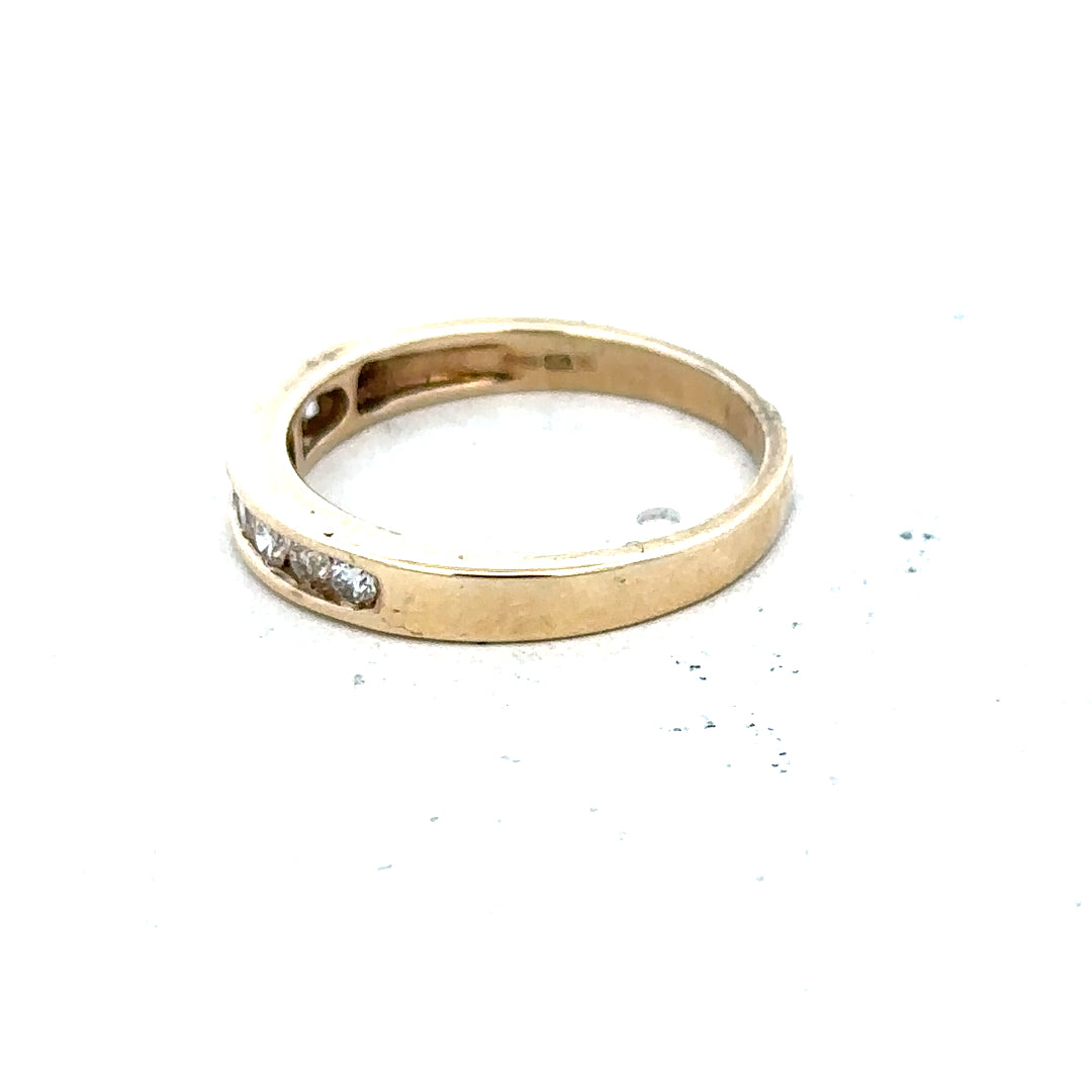 9ct yellow gold diamond ring size K1/2 with a sparkling central diamond and elegant band design.