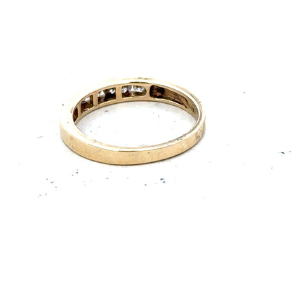 9ct yellow gold diamond ring in size K1/2 with a sparkling diamond, showcasing elegant craftsmanship and a classic design.