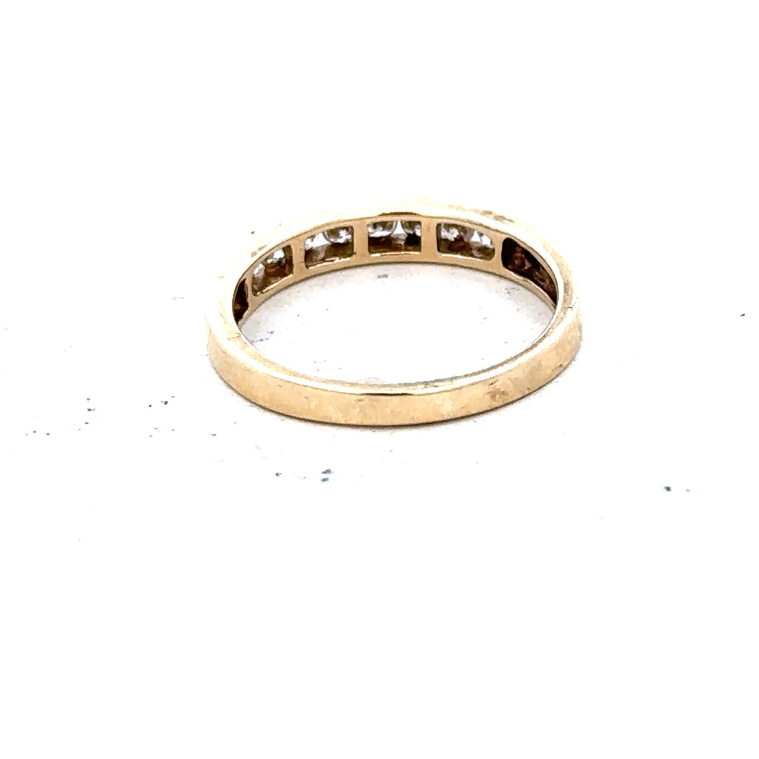 9ct yellow gold diamond ring size K1/2 with sparkling diamonds, unbranded, showcasing the elegance and shine of the jewelry.