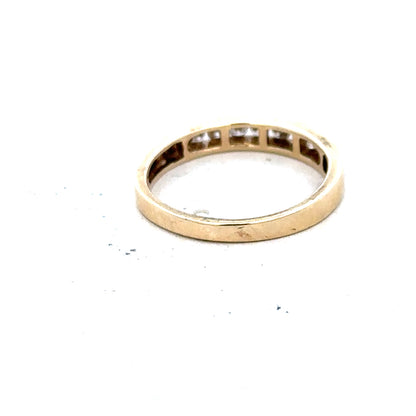 9ct yellow gold diamond ring in size K1/2, featuring a sparkling diamond set in a classic band.