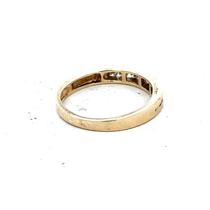 9ct yellow gold diamond ring in size K1/2, featuring a sparkling diamond set in a classic band design.