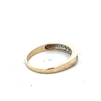 9ct yellow gold diamond ring in size K1/2, featuring a sparkling diamond centerpiece and a sleek band design.