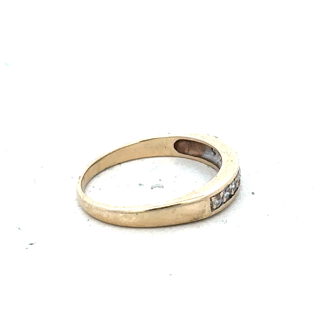 9ct yellow gold diamond ring size K1/2 with sparkling diamonds, unbranded jewelry piece, close-up of the elegant ring design.
